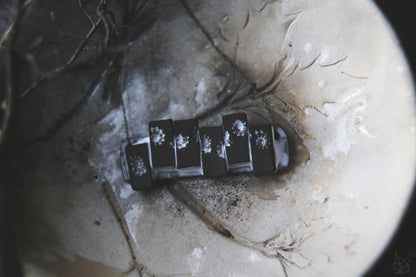 Pieces of the Tide / Black Ceramic Necklace with Seashell Iprints