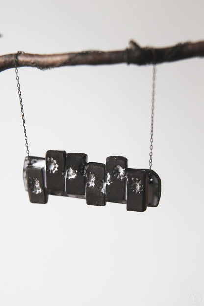 Pieces of the Tide / Black Ceramic Necklace with Seashell Iprints