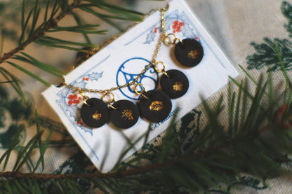Golden Coast Charms / Black Ceramics Necklace with Seashell Imprints