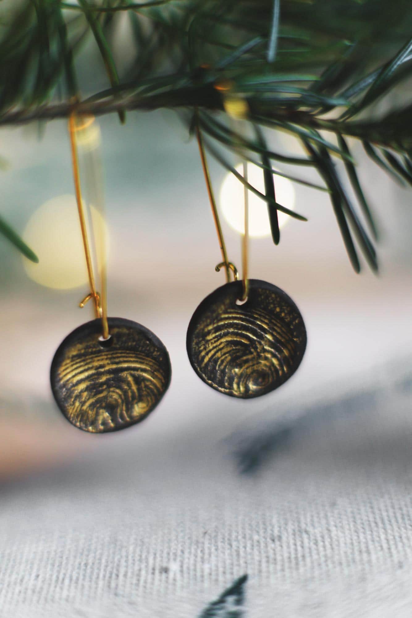 Golden Waves / Black Ceramics Earrings with Seashell Imprints