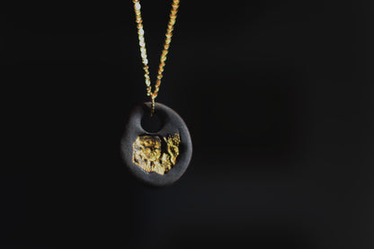 Golden Pebble / Black Ceramic Pendant with Seashell Imprint