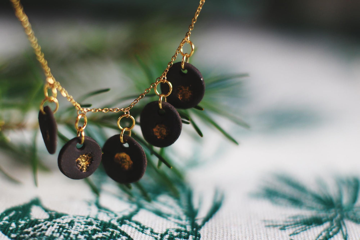 Golden Coast Charms / Black Ceramics Necklace with Seashell Imprints