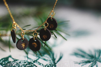 Golden Coast Charms / Black Ceramics Necklace with Seashell Imprints