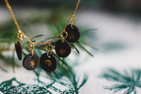 Golden Coast Charms / Black Ceramics Necklace with Seashell Imprints